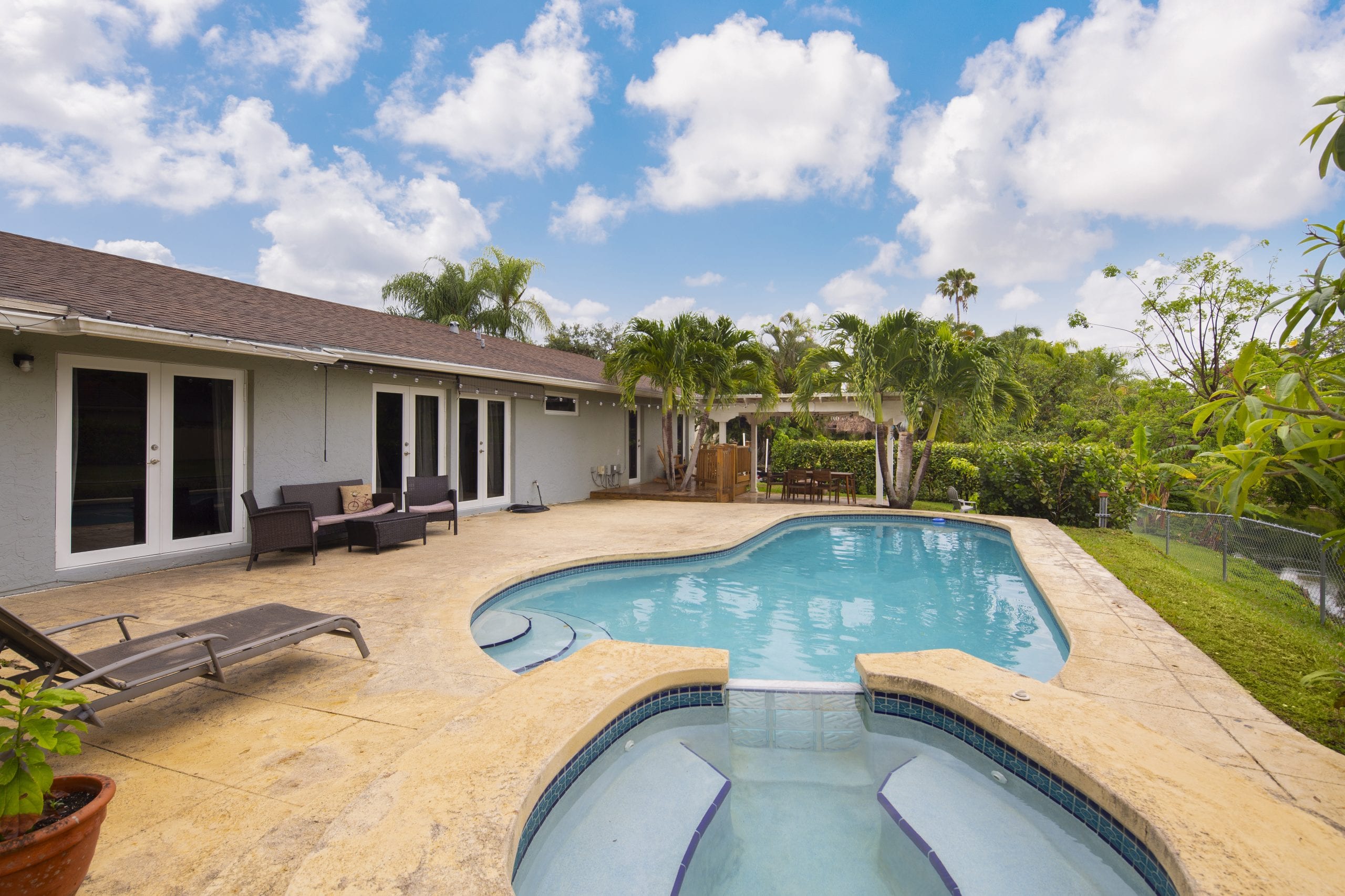 CanalFront Home with Upgraded Interior and Large Lot in Palmetto Bay Sea Grove Realty