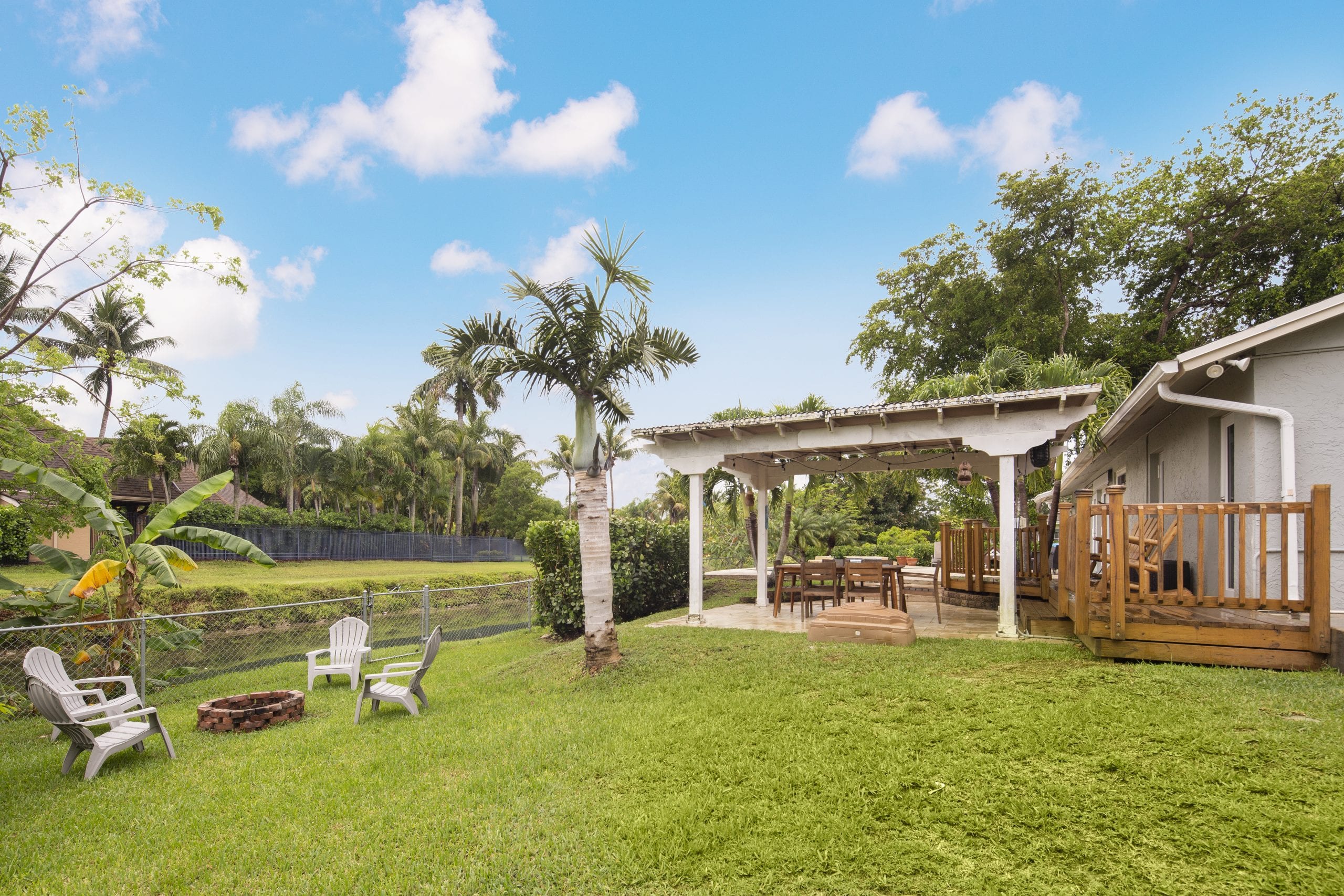 CanalFront Home with Upgraded Interior and Large Lot in Palmetto Bay Sea Grove Realty